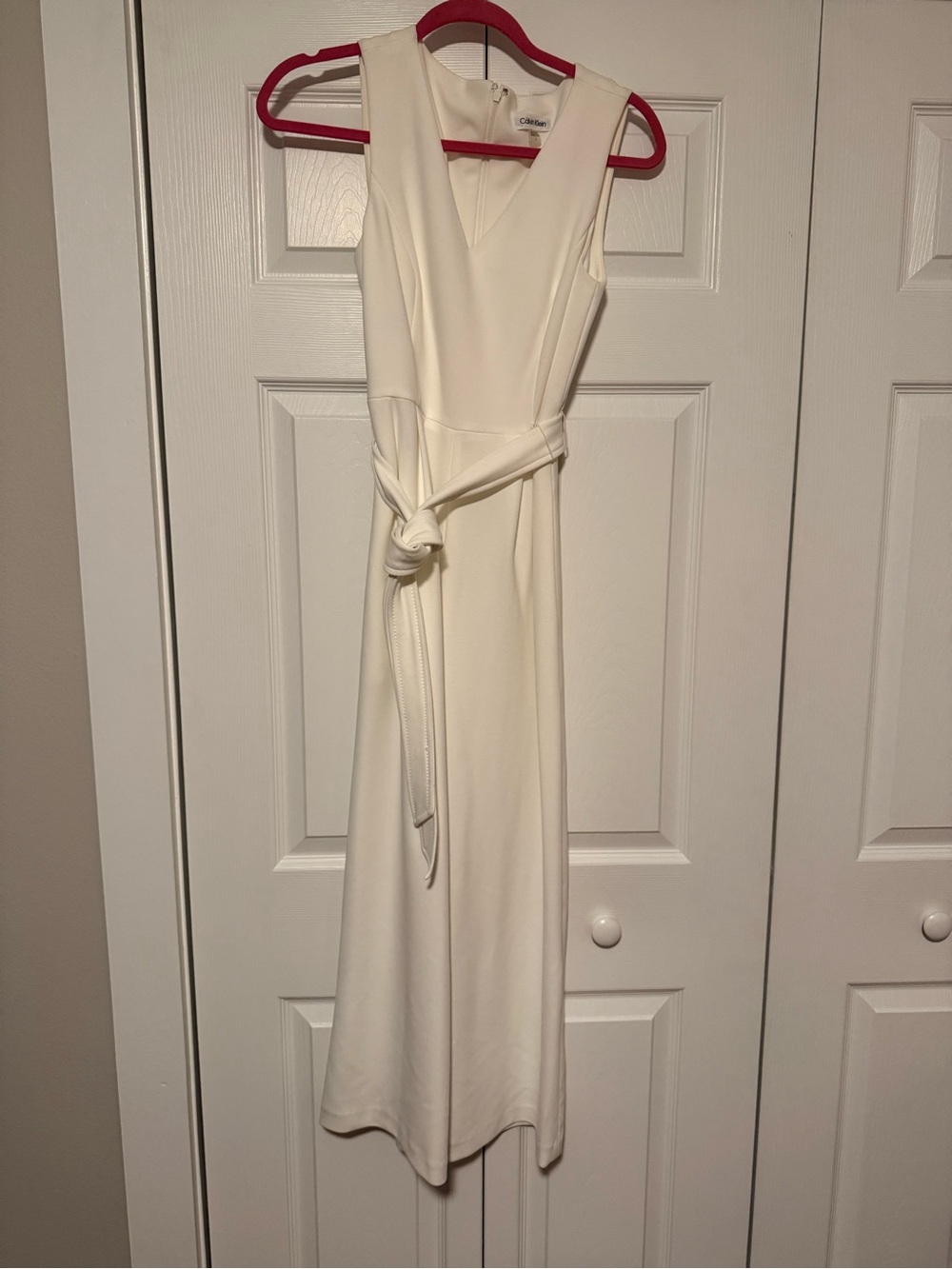 Calvin Klein Sleeveless Cream Jumpsuit Romper with Tie Waist and Pockets